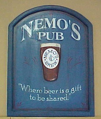 This wooden pub sign was custom made for someone's personal bar.